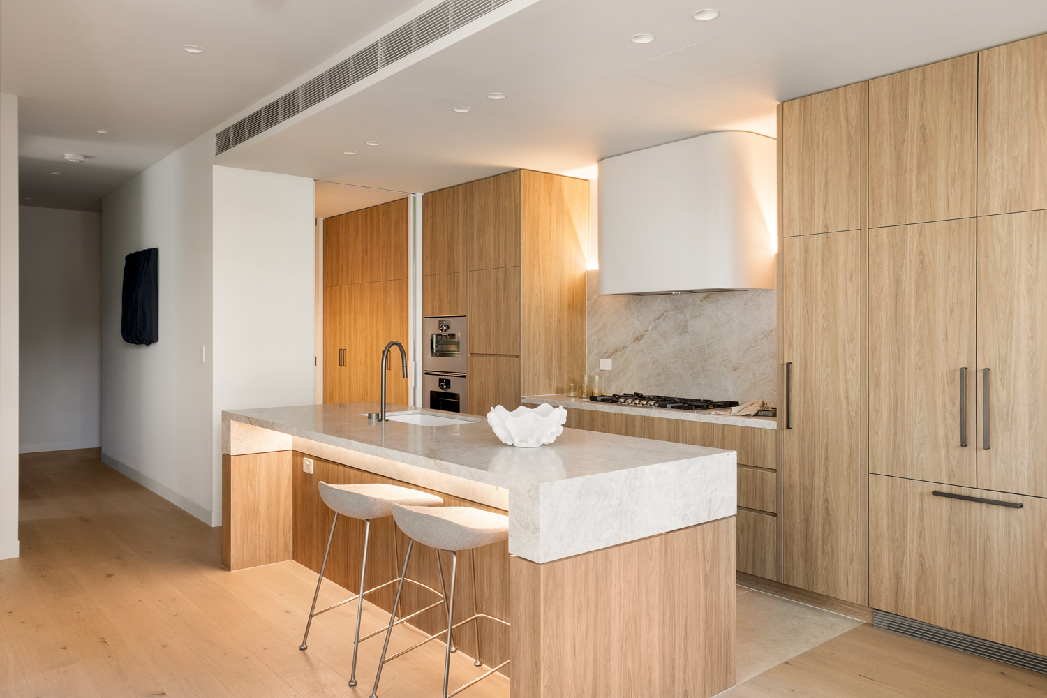 Kitchen joinery and stone splashback detail